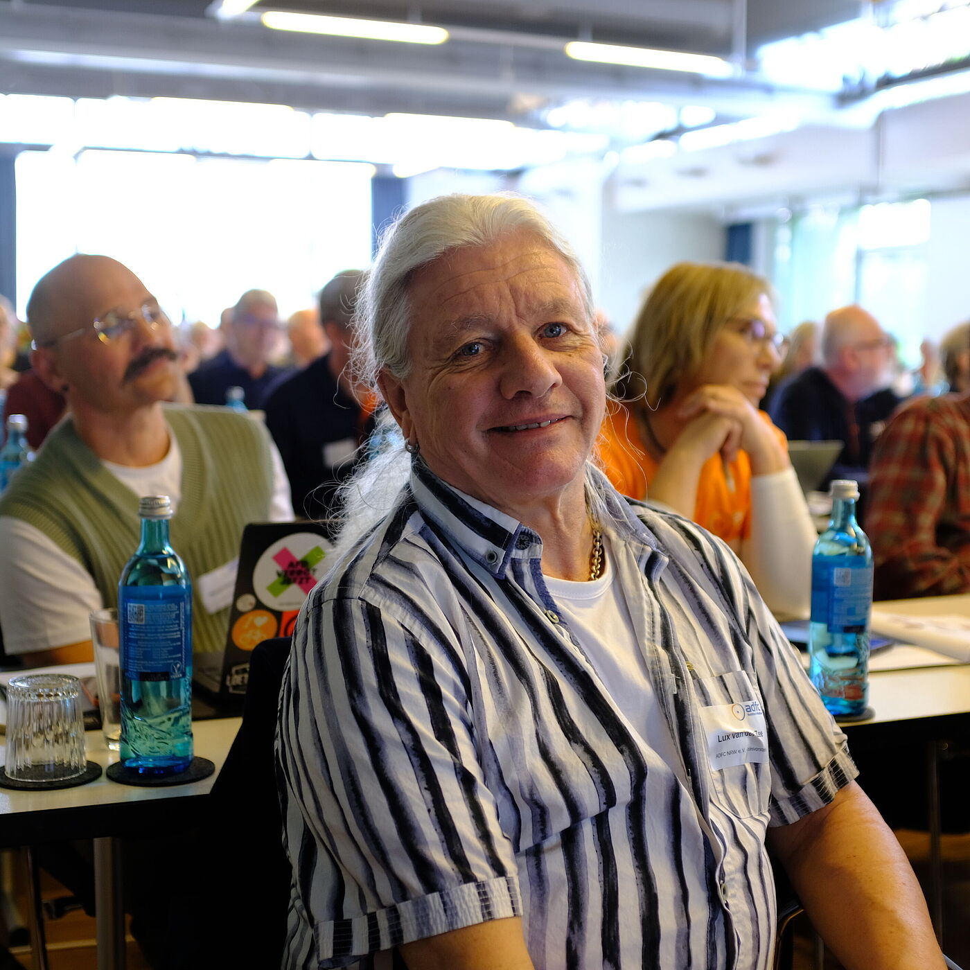 2026_04_18_Landesversammlung_Muenster_ADFC-NRW Ein Mann lächelt in die Kamera.
